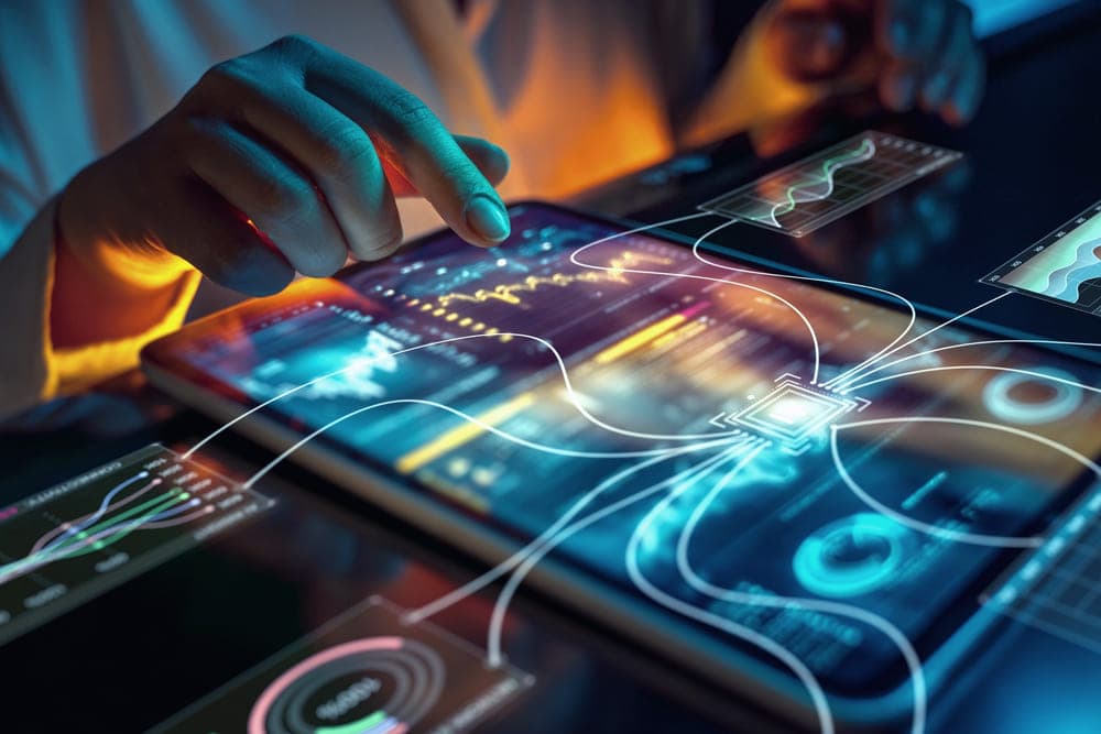 A tablet showing AI-driven data analytics dashboards
